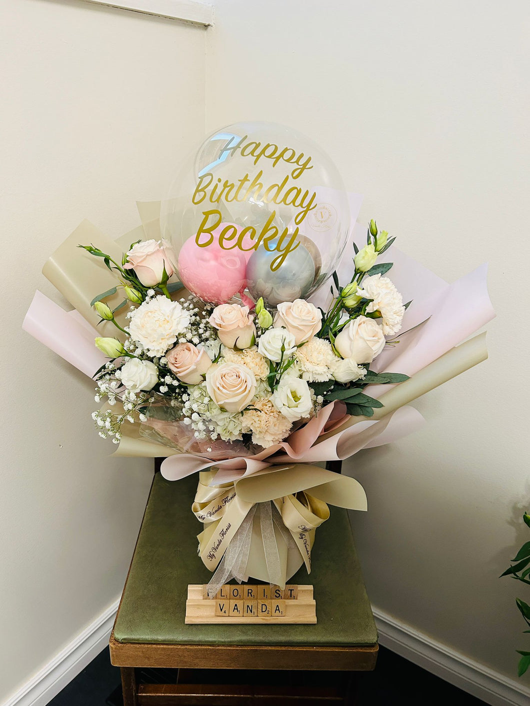 Floral bouquet with 10” balloon