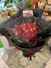 Load image into Gallery viewer, 25 stems Red Roses in Mysterious wrapping with lights
