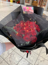 Load image into Gallery viewer, 25 stems Red Roses in Mysterious wrapping with lights
